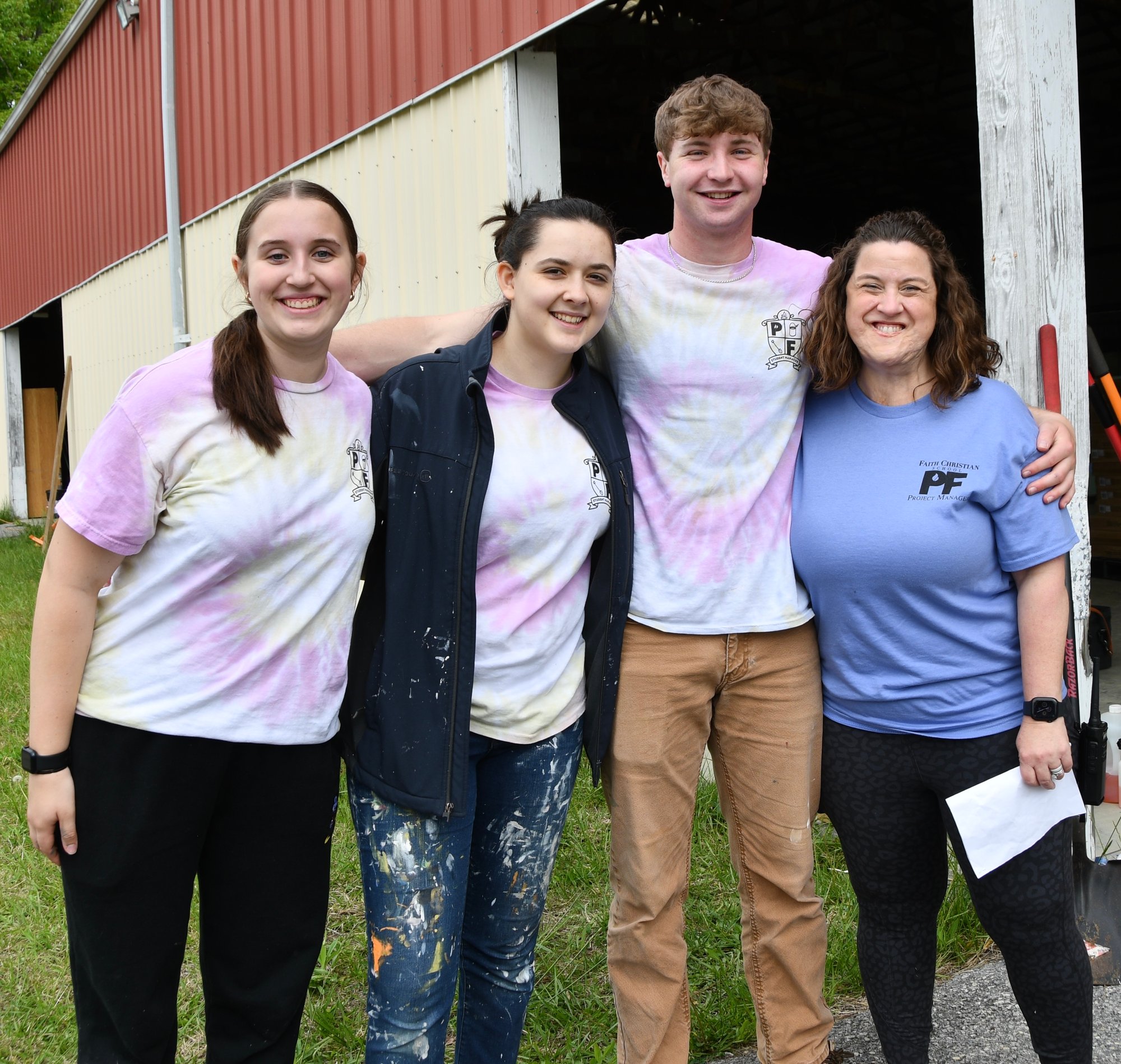 Project manager with students Project manager with students