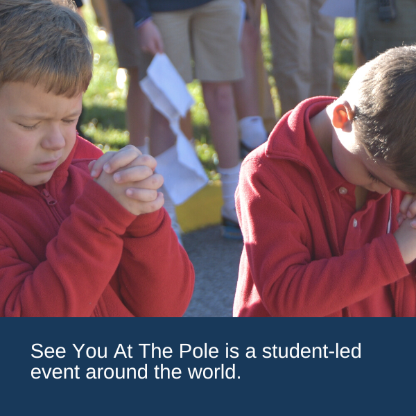Students (Kindergarten) praying at See You At The Pole event at Faith Christian School